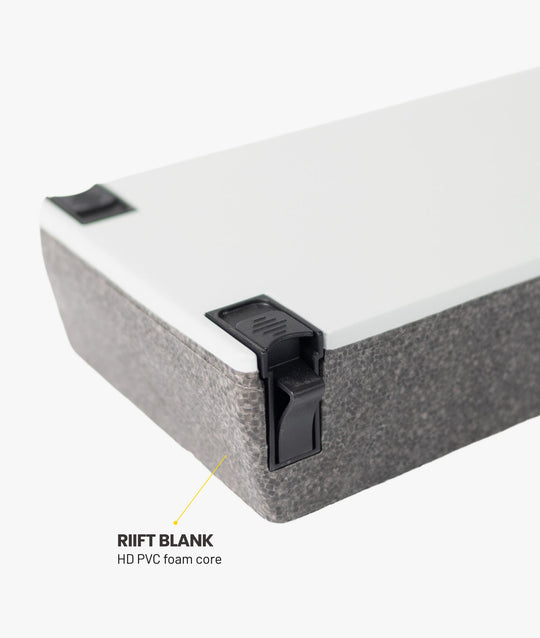 A rectangular white and grey foam insert that comes as a RIIFT Blank when RIIFT Tracks are ordered. 