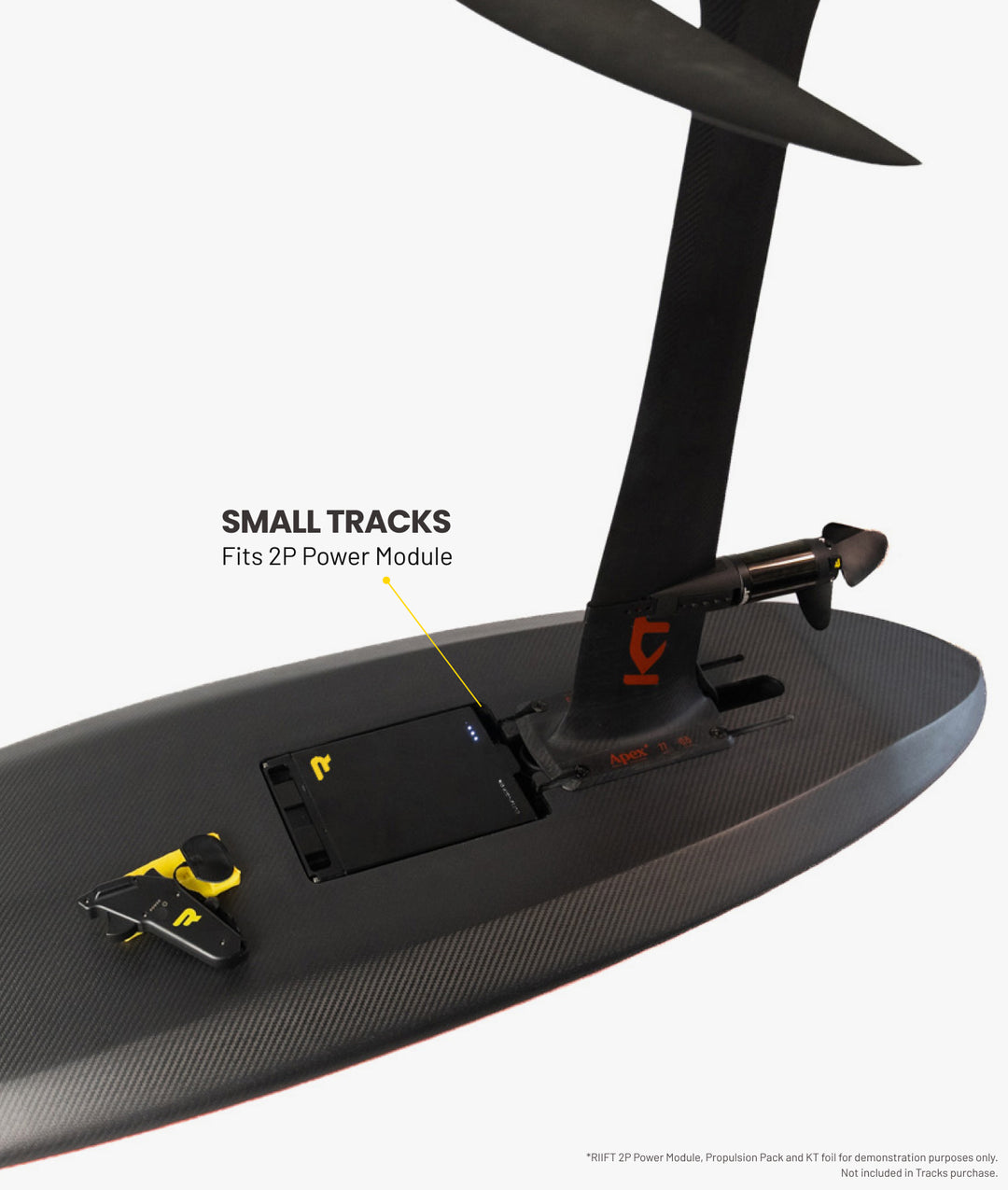 Close-up of a carbon-fiber hydrofoil board showing the underside with a battery compartment for a RIIFT Power Module.